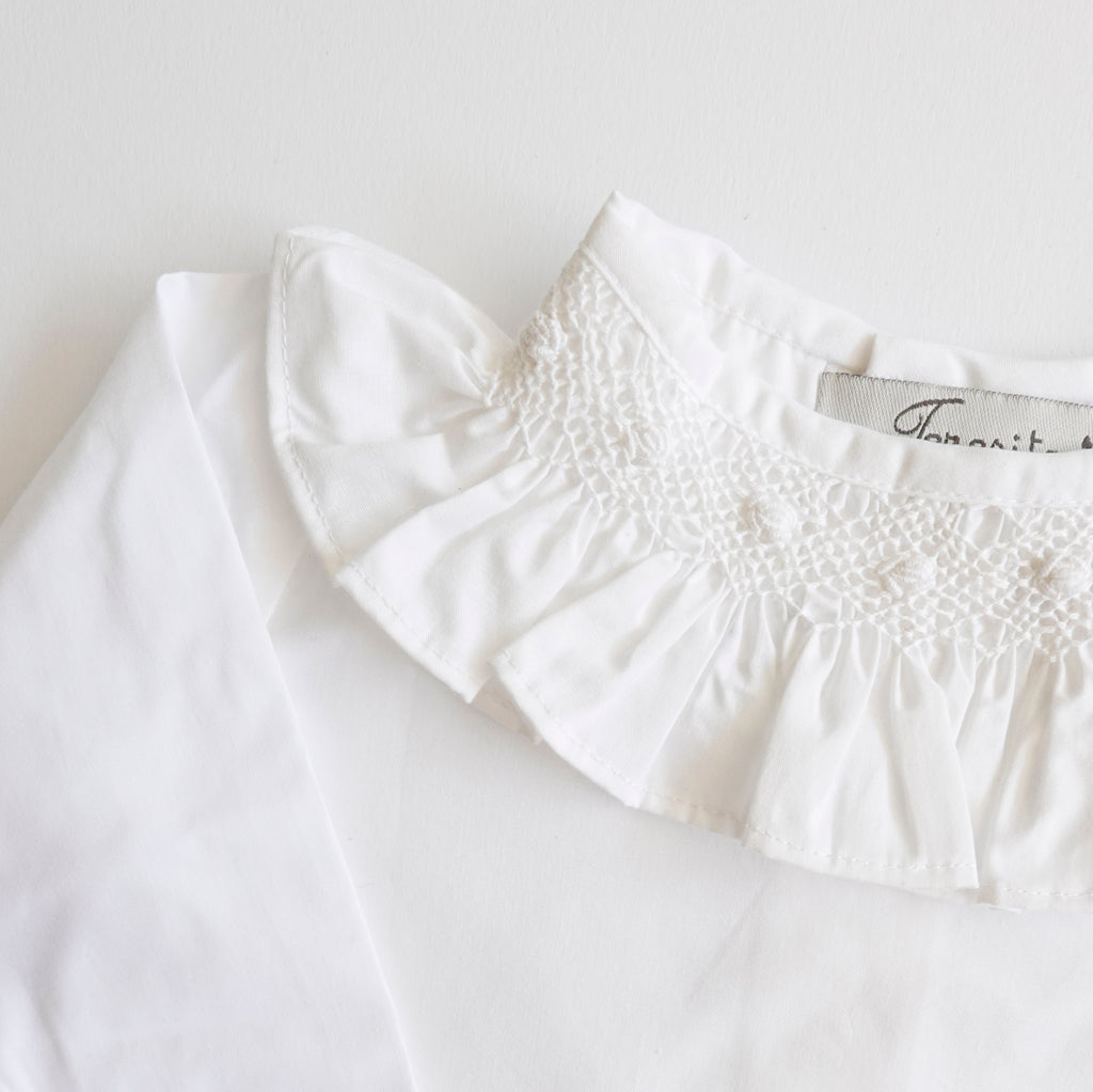 Blusa punto smock Aguila manga larga