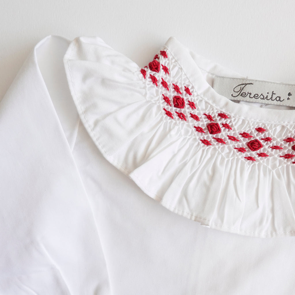 Blusa punto smock Golondrina roja manga larga