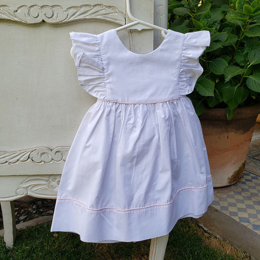 Vestido delantal vivo rosado